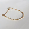 A minimal design featuring glass seed beads, galvanised metal beads and 14Kt gold-filled beads. A mismatched, imperfect design created to compliment any bracelet stack.